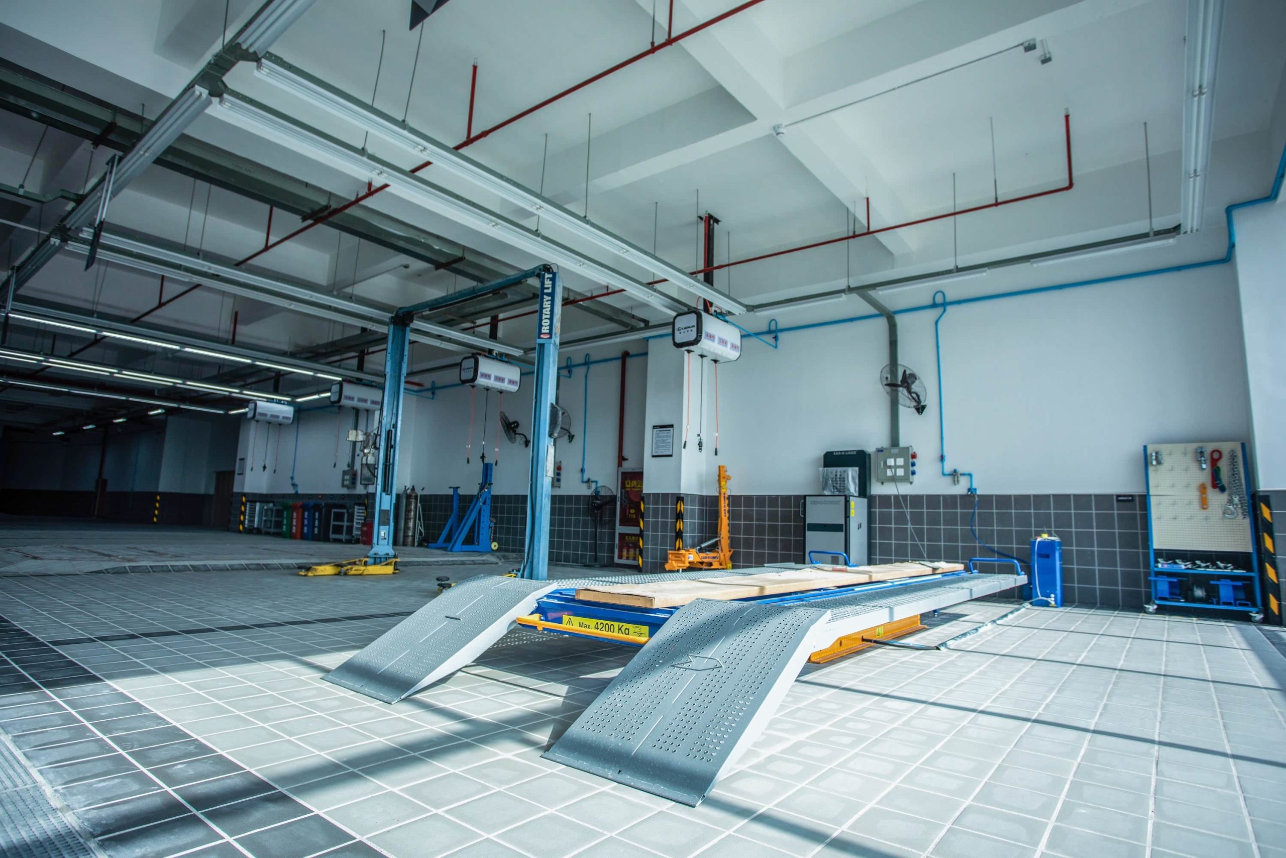 汽车维修厂尾气抽排:耐高温伸缩通风软管适配车间场景,耐腐蚀易收纳抽排稳插图 汽车维修厂尾气抽排:耐高温伸缩通风软管适配车间场景,耐腐蚀易收纳抽排稳插图